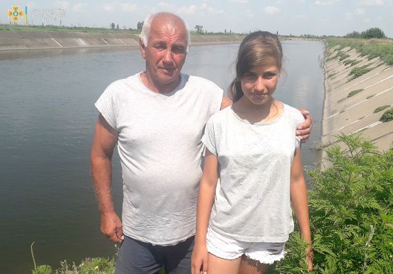 13-летнюю Катю, которая тонула в канале на Снигиревщине, спас Виктор Радченко (фото, видео)